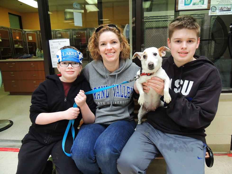 Alumna with dog and kids